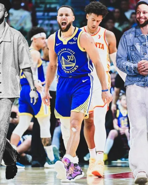 Stephen Curry, hậu vệ dẫn bóng tài năng, đối lập với vai trò trung phong trong bóng rổ